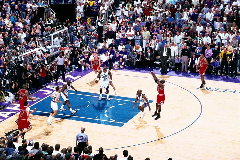 Michael Jordan, of the Chicago Bulls, shoots the game winner against the Utah Jazz in Game 6 of the 1998 NBA Finals.