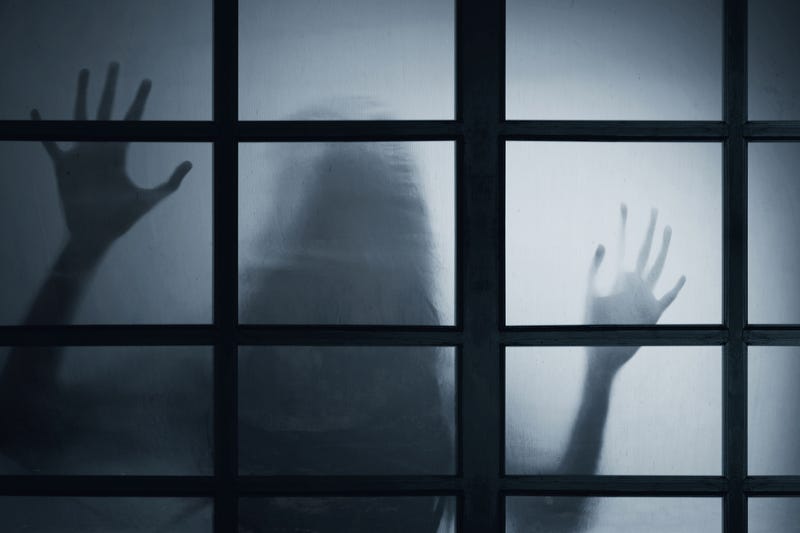 Scary shadow of a woman