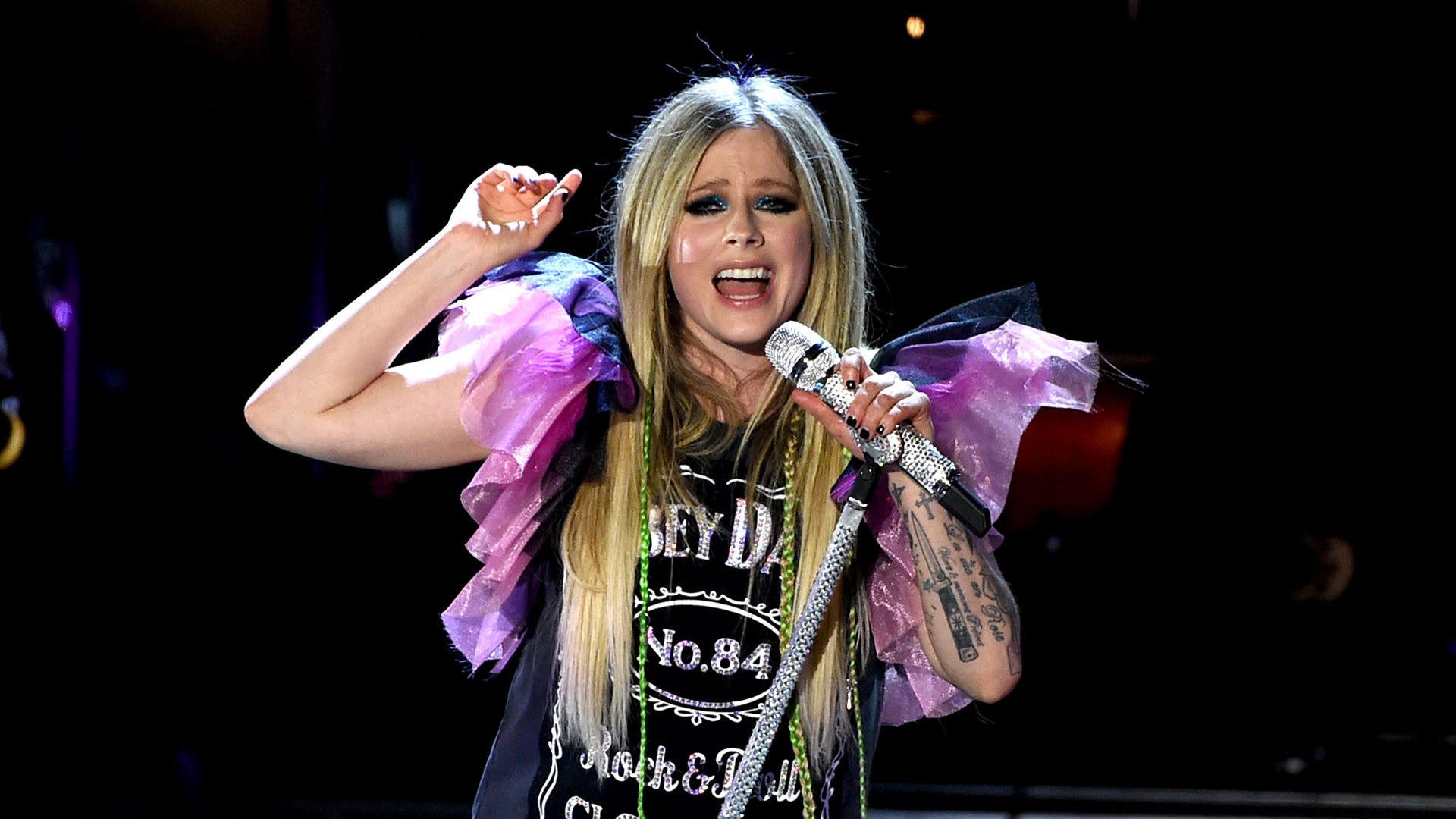 Avril Lavigne signs to Travis Barker's DTA Records imprint: 'Let’s f*** s*** up!'