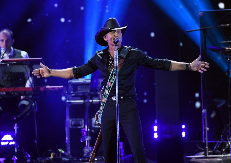 Tim McGraw performs onstage  at T-Mobile Arena