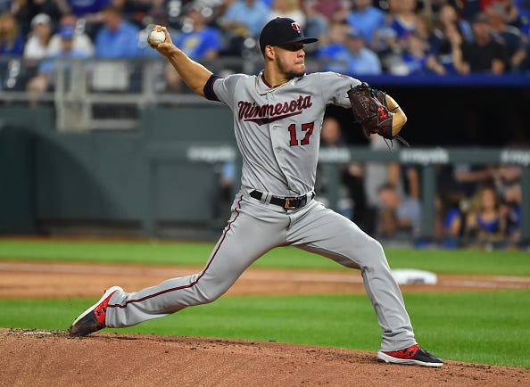Starting pitcher Jose Berrios #17 of the Minnesota Twins throws in the first inning against the Kansas City Royals at Kauffman Stadium on September 27, 2019 in Kansas City, Missouri. 