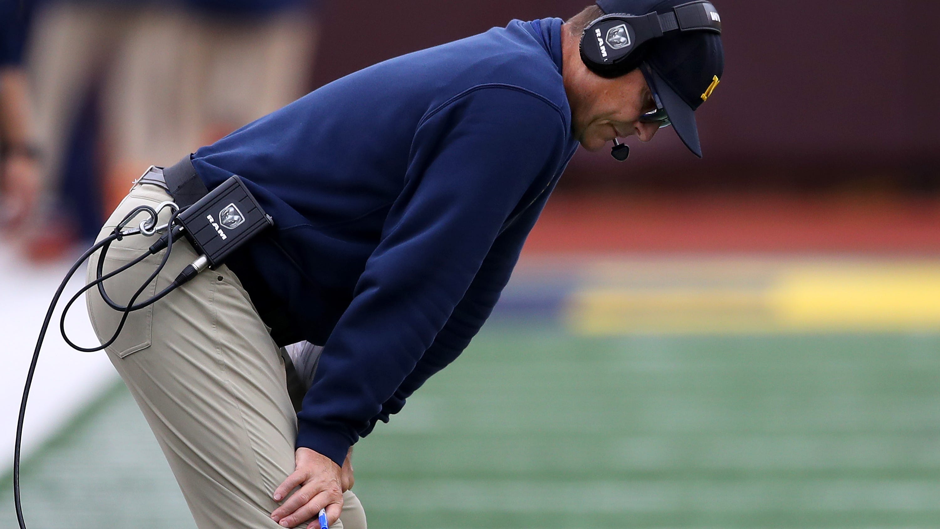 What happened between the Vikings and Jim Harbaugh?