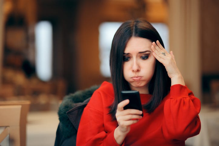 woman fed up with spam text messages