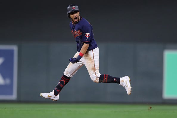 Eddie Rosario #20 of the Minnesota Twins celebrates after his solo home run against the New York Yankees in the eighth inning in game three of the American League Division Series at Target Field on October 07, 2019 in Minneapolis, Minnesota. 