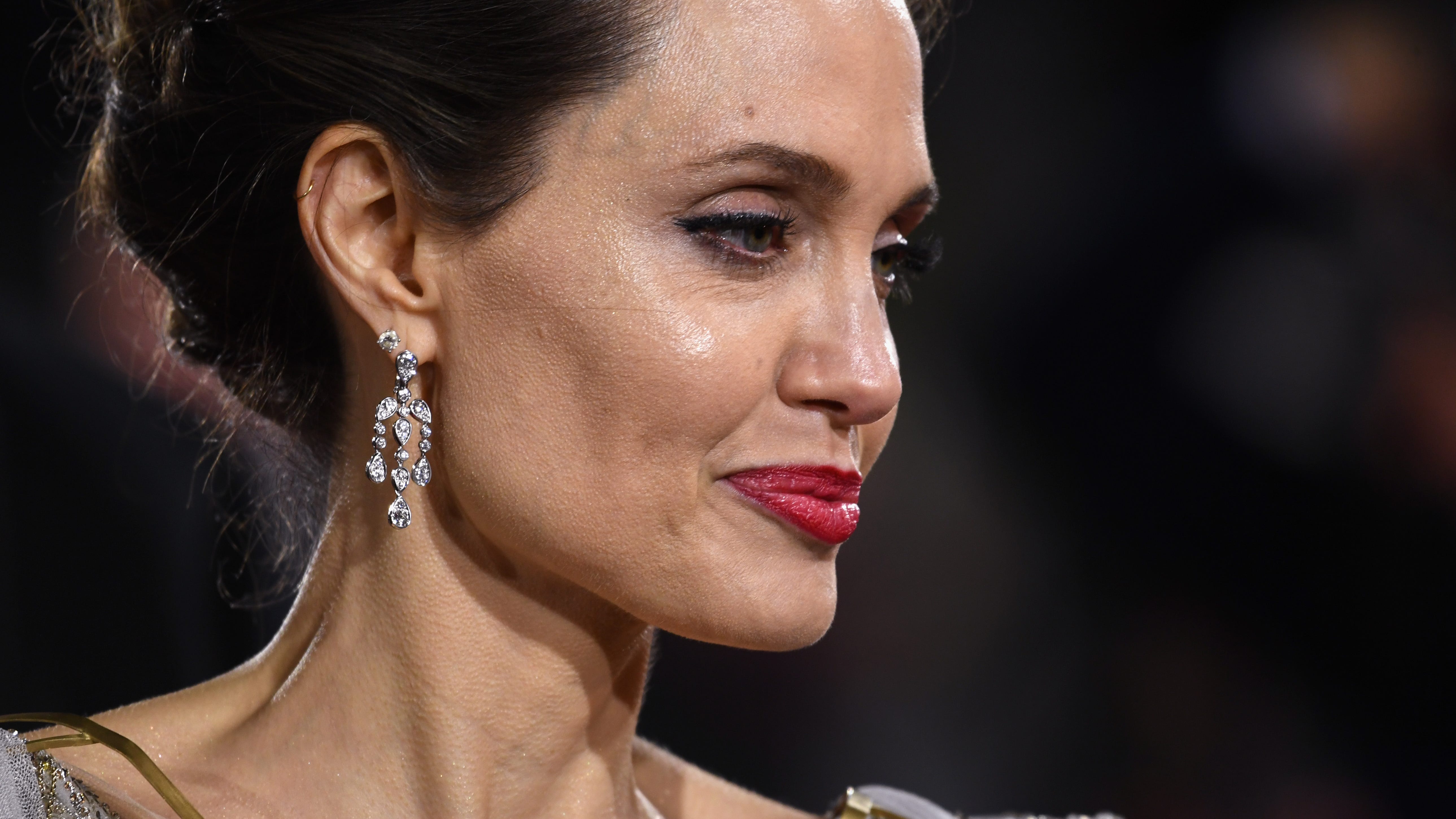Angelina Jolie Says Brad Pitt Is Keeping Her From Living Overseas
