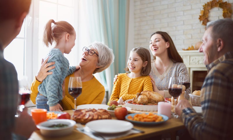 Family enjoying Thanksgiving meal