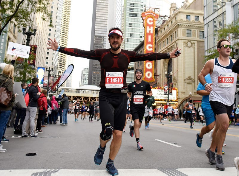 A general view of competitors running past the Chicago Theater during the 2019 Bank of America Chicago Marathon on October 13, 2019 in Chicago, Illinois.