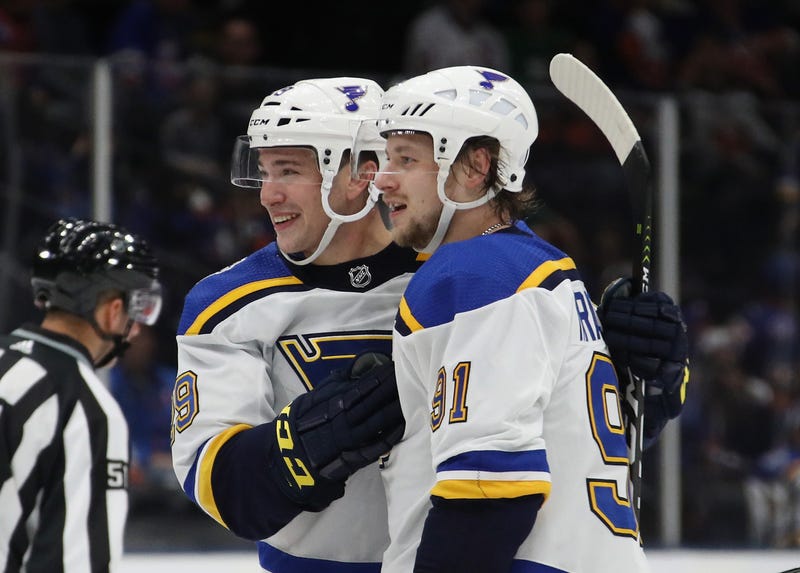 Vince Dunn #29 and Vladimir Tarasenko #91 of the St. Louis Blues skate against the New York Islanders