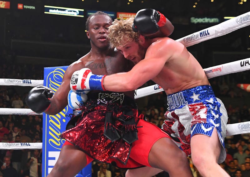  Logan Paul (red/white/blue shorts) and KSI (black/red shorts) exchange punches during their pro debut fight at Staples Center on November 9, 2019 in Los Angeles, California. KSI won by decision. (Photo by Jayne Kamin-Oncea/Getty Images)