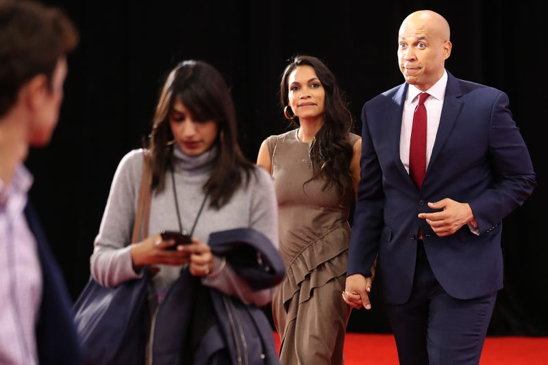Sen. Cory Booker (D-NJ) enters the Spin Room with his girlfriend Rosario Dawson after the Democratic Presidential Debate at Otterbein University on October 15, 2019 in Westerville, Ohio.