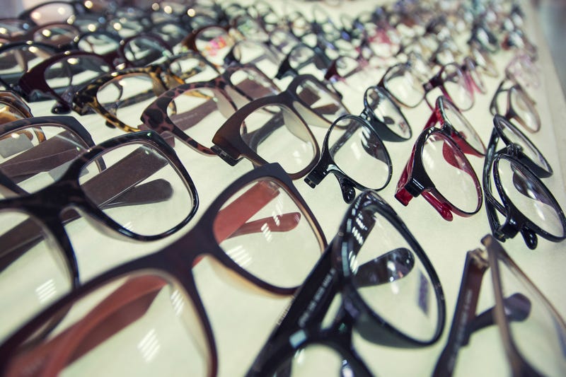Row of glasses at an opticians. Eyeglasses shop