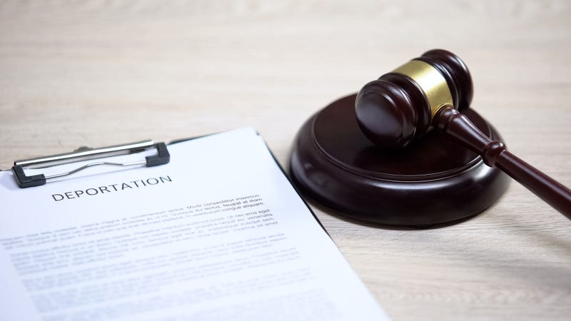Deportation paperwork and a gavel