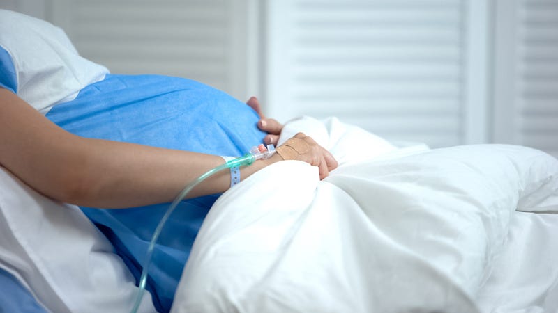 Pregnant woman having her baby. 