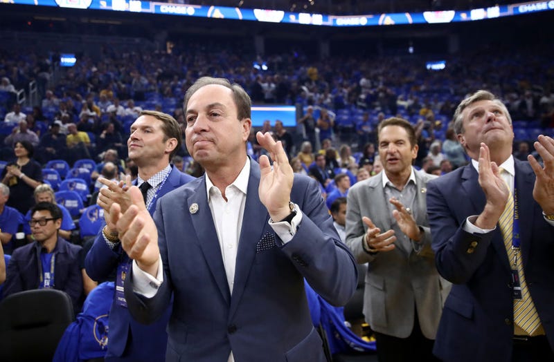Golden State Warriors owners Joe Lacob and Peter Guber stand with team president and COO Rick Welts before their game against the LA Clippers at Chase Center on October 24, 2019 in San Francisco, California.