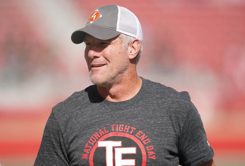 Former NFL quarterback Brett Favre wears a t-shirt that reads "National Tight End Day" before the start of an NFL game between the Carolina Panthers and San Francisco 49ers at Levi's Stadium on October 27, 2019, in Santa Clara, California.