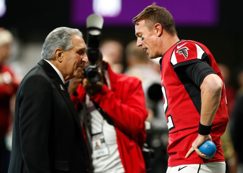 ATLANTA, GA - NOVEMBER 24: Atlanta Falcons owner and CEO Arthur Blank (L) speaks with Matt Ryan #2 prior to an NFL game against the Tampa Bay Buccaneers at Mercedes-Benz Stadium on November 24, 2019 in Atlanta, Georgia