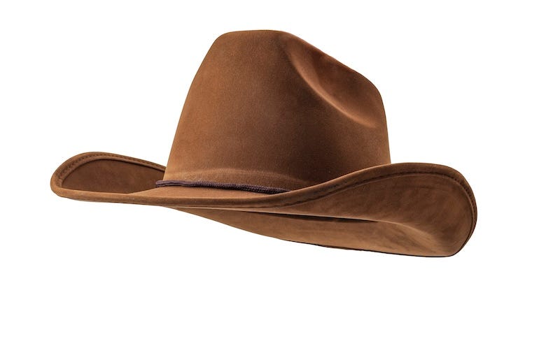 Cowboy hat against white background