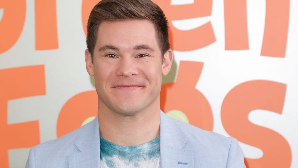 How does Adam Devine feel about being Bacchus? Scoot finds out…
