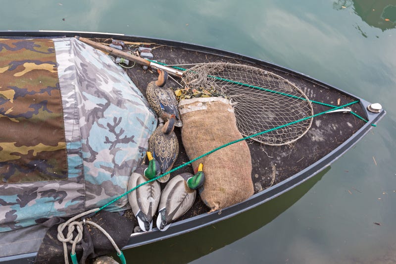Duck decoys on bow of boat