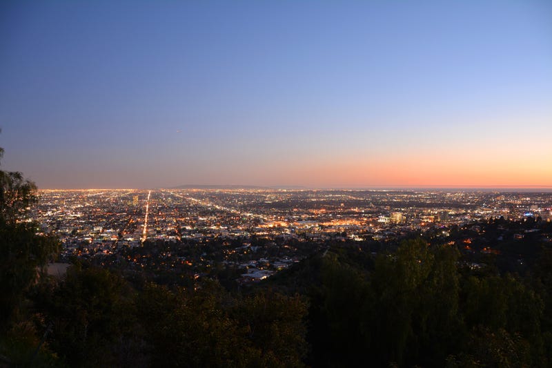 lights of los angeles under a sunset horizon