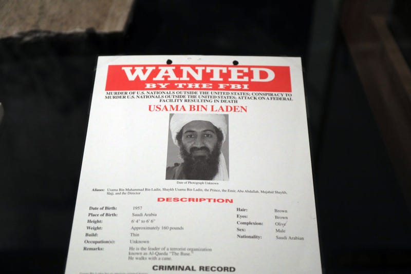 A poster and picture used to identify Osama Bin Laden is displayed at the new exhibition Revealed: The Hunt for Bin Laden at the 9/11 Memorial Museum on November 07, 2019 in New York City. The exhibition features declassified documents, testimony and objects to tell the story of the decade long hunt and capture of Osama Bin Laden, the terrorist mastermind behind the September 11 terror attacks. Opening to the public on November 15, Revealed: The Hunt for Bin Laden uses both digital and physical displays to show visitors the complexity of the search and eventual raid on Bin Laden’s Pakistani compound that led to his death.