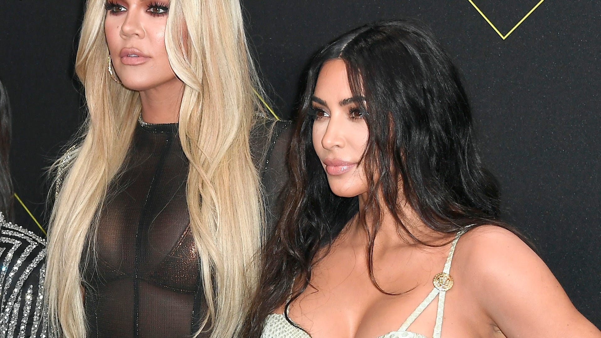 Kim and Khloe Kardashian take the town in sparkling sets