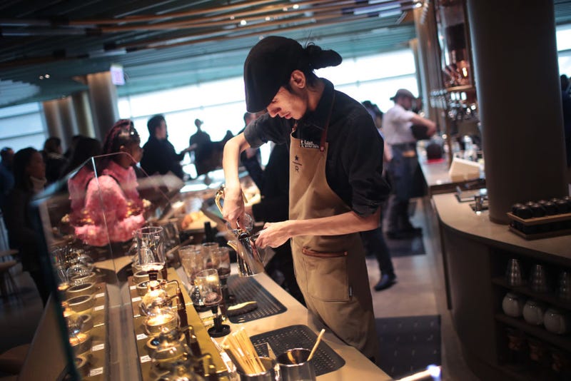 A worker prepares drinks during a media preview at Starbucks Reserve Roastery on November 12, 2019 in Chicago, Illinois. Since the store opened, some Chicago Starbucks locations decided to unionize.