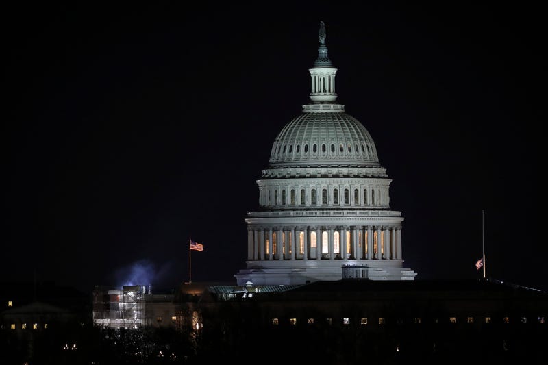 The U.S. Capitol dome stands after dark as a House Judiciary Committee markup hearing continues on the articles of impeachment against U.S. President Donald Trump in the Longworth House Office Building on Capitol Hill. 