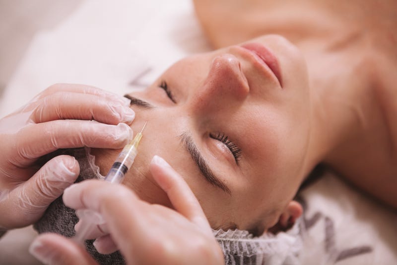 woman getting anti-wrinkle injection