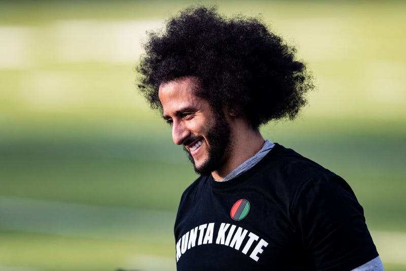 Colin Kaepernick looks on during his NFL workout held at Charles R Drew high school on November 16, 2019 in Riverdale, Georgia.