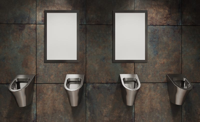 wall of urinals in a bathroom