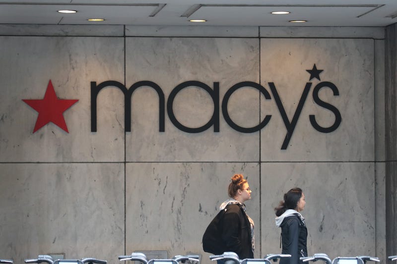 Pedestrians walk past a Macy's store downtown on November 21, 2019 in Chicago, Illinois. Macy’s Inc. reported a drop in third quarter sales and said the company is anticipating a weak holiday quarter as they, like other department stores, struggle to continue to attract customers.