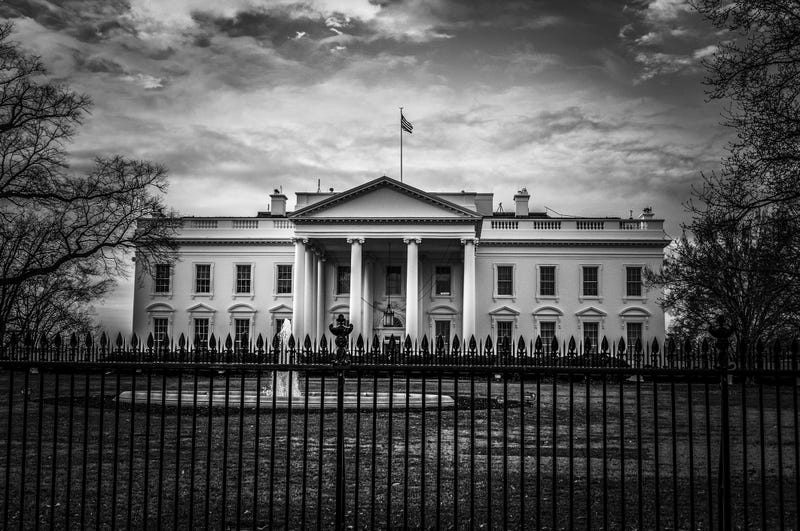 White House with foreboding storm clouds