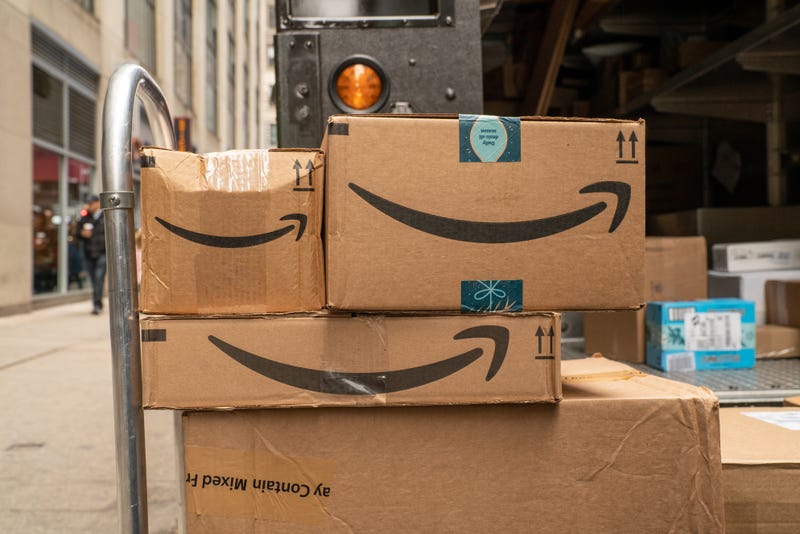 NEW YORK, NY - DECEMBER 27: A hand-truck with Amazon packages waits to be delivered on December 27, 2019 in New York City. Amazon's record breaking holiday season has risen the company's stock 4.5% and boosted the Nasdaq index above 9,000.