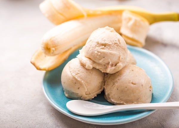 Scoops of banana ice cream on a plate