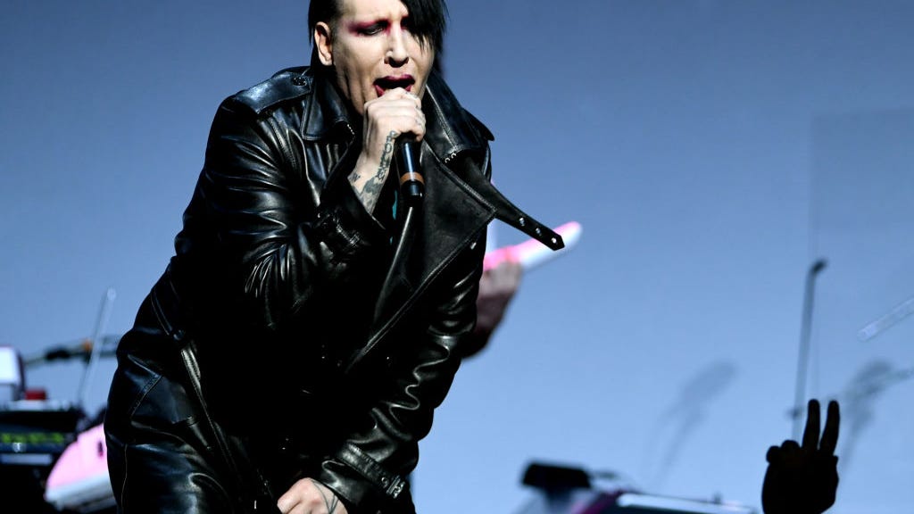 Judge dismisses suit against Marilyn Manson over spitting, nose-blowing incident
