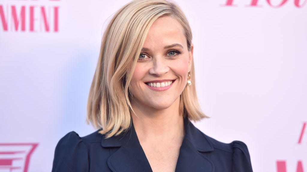 Reese Witherspoon, 45, drifts on pool float in iconic pink bikini for ‘Legally Blonde’ 20th anniversary