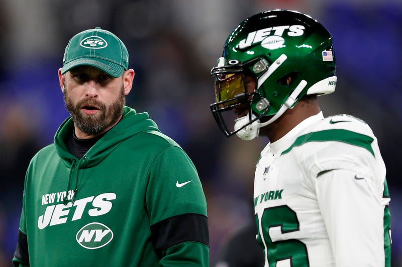Adam Gase, left, and Le'Veon Bell