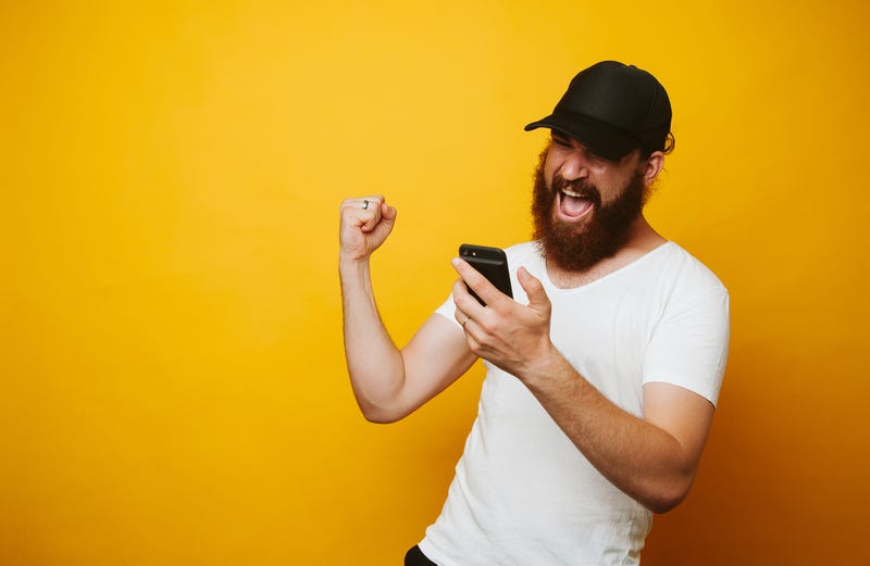 Guy Celebrating Win
