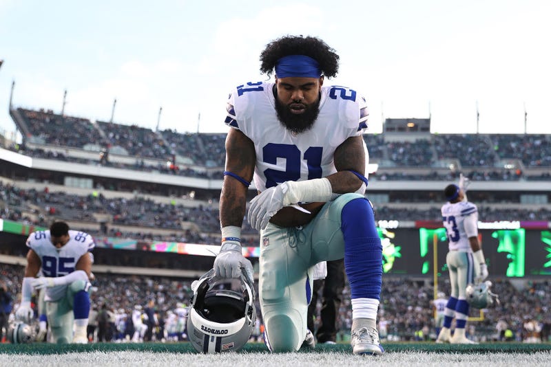 Ezekiel Elliott #21 of the Dallas Cowboys kneels in the end zone before the game against the Philadelphia Eagles at Lincoln Financial Field on December 22, 2019 in Philadelphia, Pennsylvania.