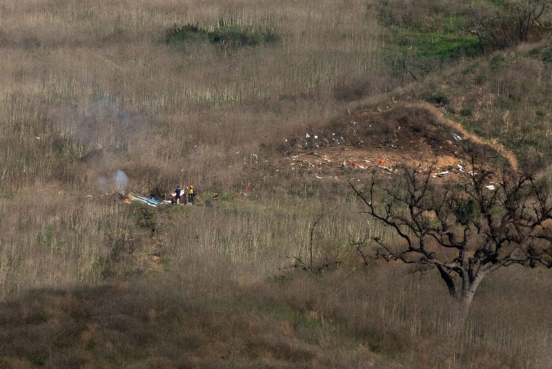 Investigators work at the scene of a helicopter crash that killed former NBA star Kobe Bryant on January 26, 2020 in Calabasas, California.