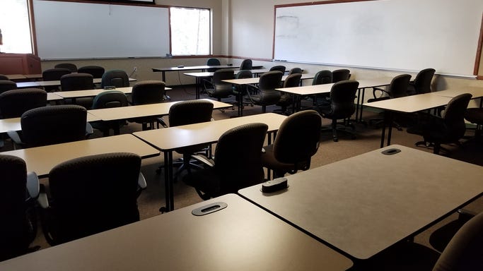 Professor with heart condition files complaint against school for not letting him teach virtually