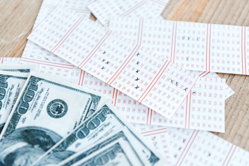 Lottery tickets and money. 