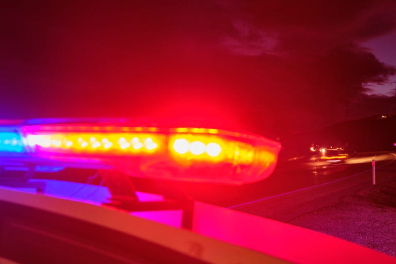 police car flashing lights in the night selective focus