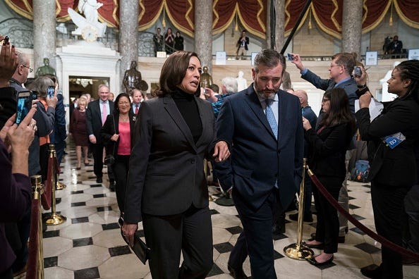 Sen. Kamala Harris (D-CA) and Sen. Ted Cruz (R-TX) walk through Statuary Hall to the House Chamber for the State of the Union on February 4, 2020 in Washington, DC.