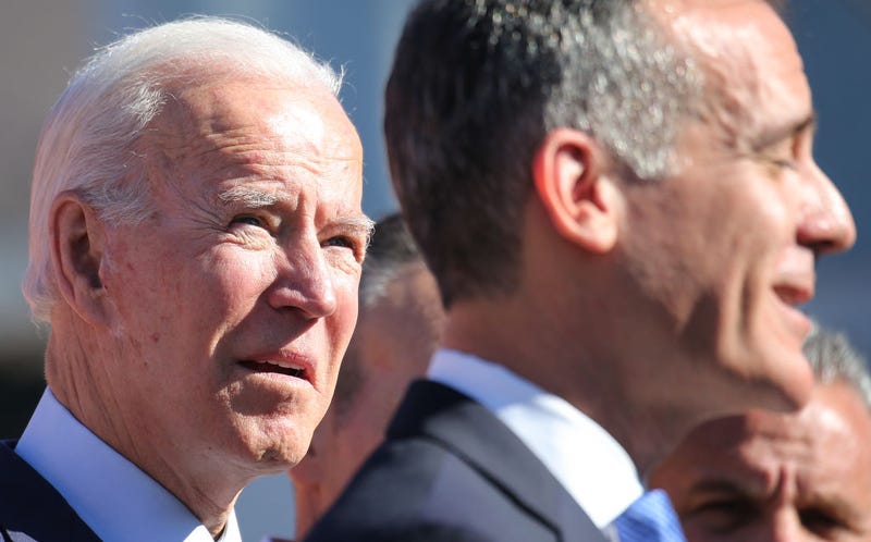 Democratic presidential candidate former U.S. Vice President Joe Biden (L) looks on as Los Angeles Mayor Eric Garcetti speaks at a campaign event at United Firefighters of Los Angeles City on January 10, 2020 in Los Angeles, California. Garcetti endorsed Biden yesterday.