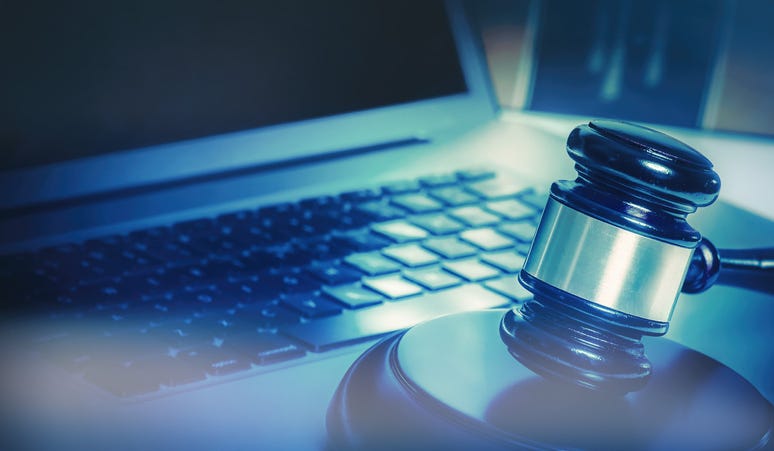 Gavel and computer