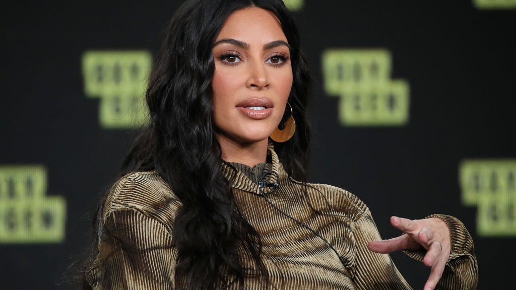Kim Kardashian denies timeline suggesting she caught COVID on birthday trip: 'False'
