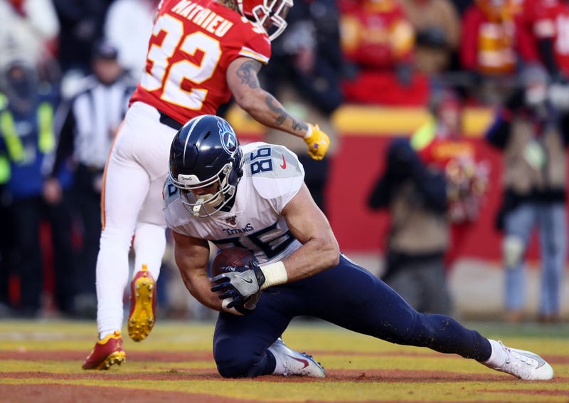 Anthony Firkser holds on to a touchdown against the Chiefs in 2019.