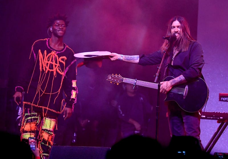 Lil Nas X and Billy Ray Cyrus perform onstage 